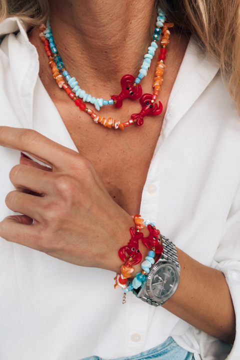 Blue Puka Shell Bracelet with Lobster Charm